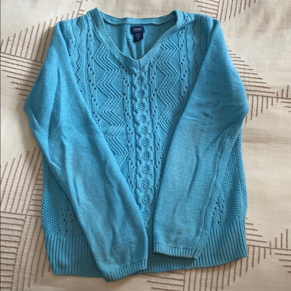 Light blue Izod sweater.